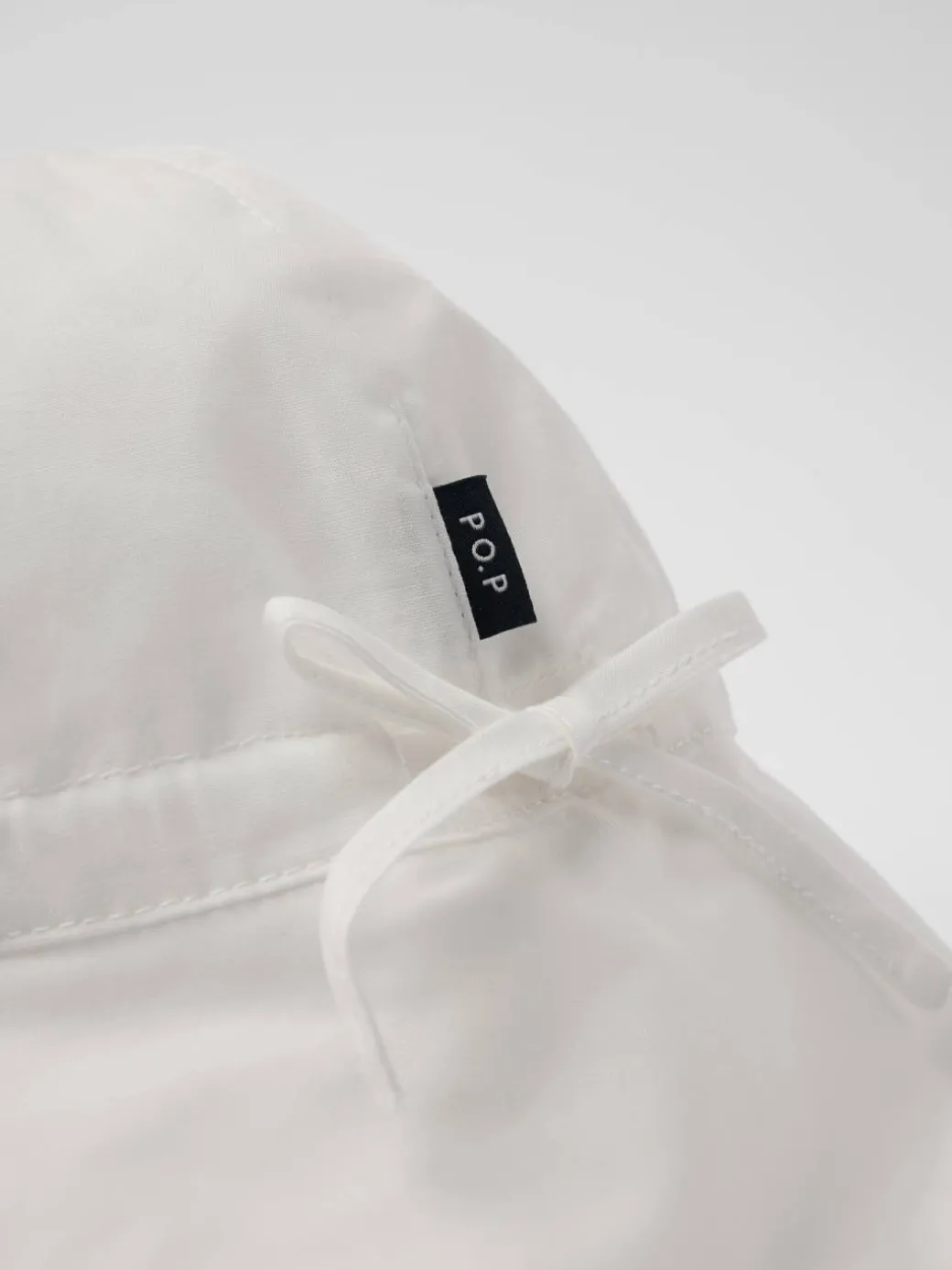 Vevd UV-cap med ører